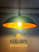 Green pendant light with a warm glow, branded 'Atlas Lights'.
