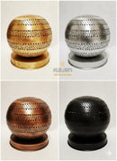 Moroccan spherical metal lamps in gold, silver, bronze, and black on a white background.