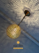 Decorative ceiling light fixture with intricate design, branded 'Atlas Lights'.