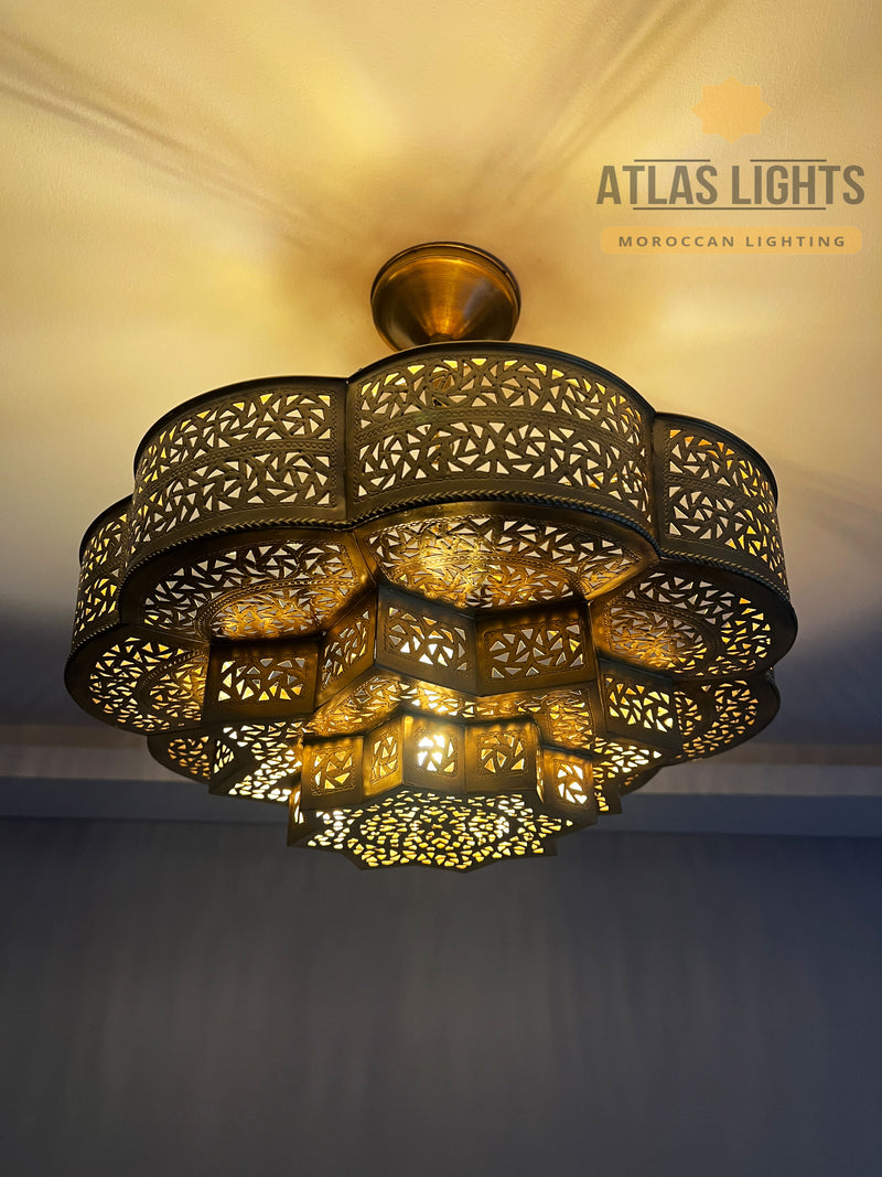 Decorative ceiling light fixture with intricate design, branded 'Atlas Lights'.